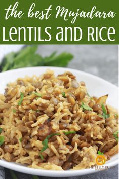 a white bowl filled with lentils and rice on top of a green table cloth