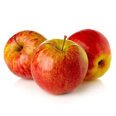 two apples sitting next to each other on a white surface