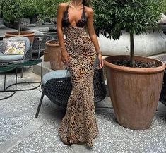 This summer, elevate your wardrobe with this stunning Lace Leopard Print Maxi Dress. Made with high-quality polyester fabric, this dress has a slight stretch for comfortable wear. The regular fit and straight silhouette flatter your figure, while the deep V-neckline and backless design add a touch of sensuality. The delicate lace detailing and ankle-length hemline bring a touch of elegance to this sexy and chic dress. Perfect for any occasion, this dress will surely turn heads and leave a lasting impression. Don't miss out on adding this dress to your collection - order now before it's gone! Leopard Print Maxi Dress, Backless Design, Style Maxi Dress, Mini Dresses Summer, Printed Maxi, 50's Dress, Mini Dress With Sleeves, The Deep, Chic Dress