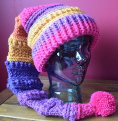 a knitted hat on top of a mannequin head