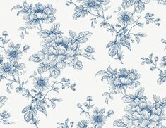 a blue and white floral wallpaper with large flowers on the left side of it