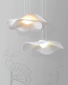 two suspended lights in the shape of flowers