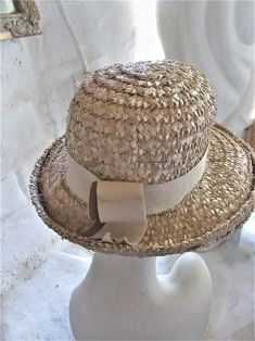 "STYLISH BEIGE 60's SUN HAT This stylish hat is a fashion statement that would work for any era--a good choice for an afternoon garden party, wedding or day at the races...or a stroll down the sidewalk! It is well made despite no maker's label, in a color that will go with almost anything. It has a hatband of beige with a 2 tone grosgrain ribbon in brown and beige at the back and would be ideal for brown spectator pumps. A vintage treasure to last another lifetime or 2! Very good to excellent co Spectator Pumps, 1960s Hats, Day At The Races, Mid Century Fashion, Baby Shower Tea, Bridal Shower Tea, Wide Brim Fedora, Disposable Plates, Garden Party Wedding