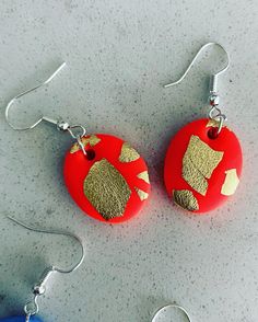 Handmade neon orange polymer clay and gold leaf earrings  Hook fastening Unique Gold Polymer Clay Jewelry, Gold Polymer Clay Dangle Jewelry, Handmade Gold Polymer Clay Jewelry, Gold Resin Jewelry With Ear Wire, Gold Resin Dangle Jewelry, Nickel Free Gold Polymer Clay Jewelry, Handmade Red Earrings For Her, Nickel-free Gold Polymer Clay Jewelry, Handmade Red Earrings Gift For Her