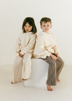 Fostered Collection features minimal kids clothes designed to last. Discover timeless kids outfits in neutral tones that blend effortlessly into any child's wardrobe. Our practical and sustainable kids clothes feature cotton basics for kids and neutral colors, so your family can shop for their whole minimal kids wardrobe in one place! Shop the new Fostered Collection kids clothing collection online now! Fostered Collection, Uniqlo Kids, Kids Wardrobe, Kids Fashion Clothes, Winter Kids, Kids Branding, Family Photoshoot, Yearbook, Neutral Tones