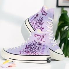 * Product details: ''Embroidered Converse High Tops, Purple Flowers Embroidered Converse Custom, Dandelion Embroidred Sneakers, Garden Purple Flower Embroidered Converse Personalized, Gift for Her'' Shoe type: Converse Chuck Taylor 1970s Converse color: 16. 1970s Light Purpe Price includes: Shoes + Embroidered floral motifs as shown or studded with sparkling stones and lace as shown. Converse Custom shoes are meticulously embroidered and lace-attached, sturdy and durable.  Converse shoes can be Purple Embroidered Converse, Personalized Converse, Custom Converse Shoes, Purple Converse