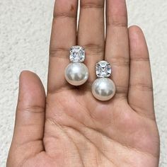 CZ Diamond Pearl Drop Earrings, These earrings are perfect for any special occasion. You can wear these earrings on everyday office look to chic party look. It will enhance your any attire. Also perfect for birthday gift to wedding anniversary gift for her. *𝐏𝐑𝐎𝐃𝐔𝐂𝐓 𝐃𝐄𝐓𝐀𝐈𝐋* * 𝐌𝐚𝐭𝐞𝐫𝐢𝐚𝐥: Brass * 𝐏𝐥𝐚𝐭𝐢𝐧𝐠: White Rhodium Plated * 𝐒𝐭𝐨𝐧𝐞: AAA-quality CZ Diamond & Pearl. 𝐕𝐢𝐬𝐢𝐭 𝐎𝐮𝐫 𝐅𝐀𝐐𝐬 𝐟𝐨𝐫 𝐒𝐡𝐢𝐩𝐩𝐢𝐧𝐠 𝐏𝐨𝐥𝐢𝐜𝐢𝐞𝐬 𝐚𝐧𝐝 𝐂𝐚𝐫𝐞 𝐈𝐧𝐬𝐭𝐫𝐮𝐜𝐭? Pearl Diamond Earrings, Diamond Wedding Jewelry, Earrings Luxury, Pearl Jewelry Wedding, Pearl And Diamond Earrings, Chic Party, Wedding Gifts For Bridesmaids, Etsy Bridesmaid Gifts, Pearl Diamond