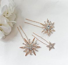 Add a touch of elegance to your hairdo with these stunning hair clips. The star pattern makes it a perfect accessory for any occasion, especially weddings.  Made from high quality metal and features a sparkling gold finish, making them a great addition to any bridal or bridesmaid outfit. Measurements Large pin - lenght 9.5cm, width 5.1 cm Medium pin- lenght 9.5cm width 4.2cm Small pin- lenght 7.5 cm, width 3cm  Ship with Royal Mail service. Express delivery available at checkout. Thank you for v Crystal Hair Pins Wedding, Star Hair Pins, Wedding Hair Pins Crystal, Hair Pins Wedding, Star Crystal, Crystal Hair Pins, Wedding Hair Clips, Star Hair, Wedding Hair Pins