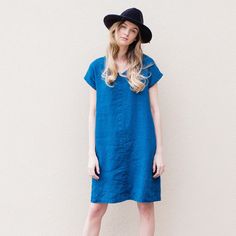 "Handcrafted Oeko-Tex Standard certified 100% European linen dress ideal for everyday wear. Perfect for chilly summer days. Always dress to kill! Neckline: round Length: ±37\"/95cm (we can make adjustments) Pockets: side seam Details: *Colour shown: teal blue *Model is wearing size M *Medium weight *Maternity-friendly *Relaxed fit *Not-ironed (and no need to) *Handmade by @LinenCloud Easy care: - Machine wash gentle - Wash seperately or with similar colours - Tumble dry on low heat - Non-iron. S Casual Blue Linen Dress, Relaxed Fit Flax Linen Dress, Casual Flax Color Relaxed Fit Dress, Short Sleeve Linen Shift Dress, Casual Flax Linen Dress For Daywear, V-neck Shift Linen Dress, Casual Flax Linen Knee-length Dress, Casual Flax-colored Knee-length Linen Dress, Casual Knee-length Flax Linen Dress