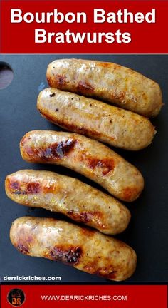 four cooked bratwursts sitting on top of a black surface with the words bourbon battered bratwursts