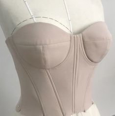 a corset is shown on a mannequin