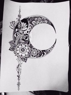 a drawing of a crescent with flowers and leaves on the side, in black and white