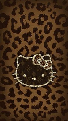 an iphone case with a hello kitty design on the front and back cover in leopard print