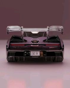 the rear end of a purple sports car