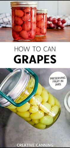 jars filled with grapes sitting on top of a table