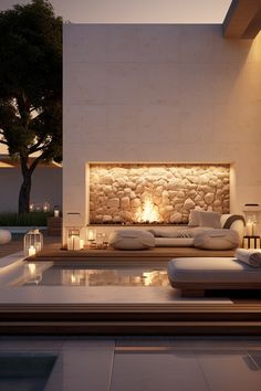 a living room with a fire place next to a pool