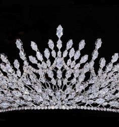 a large crystal tiara is shown on a black background