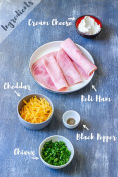 ingredients to make an appetizer laid out in bowls on a blue tablecloth