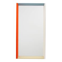 an orange and white framed mirror against a white background