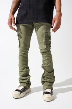 SERENEDE® "OIL" cargo stacked jeans feature our signature stretch material for a comfortable feel. Olive wash* with a slight tint of green. SERENEDE® signature skinny fit construction with a stacked ankle. This unique style features multiple cargo pockets. Designed to be individually unique. DETAILED FEATURES: OLIVE wash [ slight tint of green ] Cargo pockets Stacked finish Fading throughout Signature "leather" waistband label SERENEDE® branded hardware Five-pocket styling Zipper fly 5.5" W Ankl Fitted Khaki Cargo Pants For Streetwear, Urban Green Jeans With Pockets, Green Military Cargo Jeans, Fitted Urban Cargo Jeans With Cargo Pockets, Fitted Urban Cargo Jeans, Military Style Green Straight Leg Cargo Jeans, Military Green Straight Leg Cargo Jeans, Olive Military Cargo Pants For Streetwear, Military Style Olive Cargo Pants For Streetwear