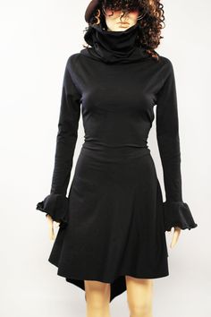 Turtleneck dress with Fit-Flare skirt and tie up back, any colors. Details: - Stretch cotton jersey knit fabric - Hi-Low skirt - Row edge - Oversized turtlenck - Long bell sleeves - tie in the back (tighten or loosen the dress) - Slips on - 95% cotton, 5% Lycra (light weight) - Machine wash, hand dry, no ironing needed SIZE XS (US S 0-2, UK 6-8, Italian 36-38, French 32-34) Bust: fits bust around 32-33 Waist: fits waist around 24-25 Hips: fits hips around 35-36 SIZE S(US S 4-6, UK 10-12, Italian Fitted Flared Dress For Fall, Black Fitted Mini Dress With Flared Hem, Fitted Skirted Dress For Fall, Black Stretch Dresses With Flared Skirt, Black Stretch Dress With Flared Skirt, Black Stretch Flared Skirt Dress, Black Fitted Skirted Dress, Fitted Black Skirted Dress, Black Flared Dress With Ruffles