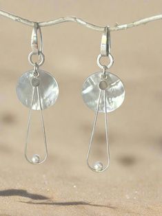 These stunning sterling silver teardrop earrings are adorned with a cultured pearl, evoking a sense of coastal charm and elegance. Inspired by the allure of Key West's oceanic scenery, these earrings blend classic design with a touch of seaside sophistication, making them the perfect accessory for any occasion. Key West Fl, Coastal Charm, Key West, Teardrop Earrings, Classic Design, Jewelry Earrings Dangle, Etsy Earrings, Dangle Drop Earrings, Dangle Earrings