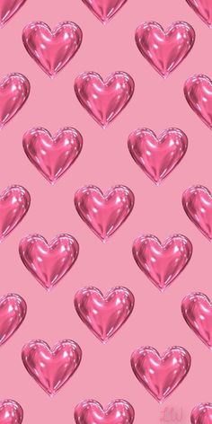 many shiny hearts on a pink background