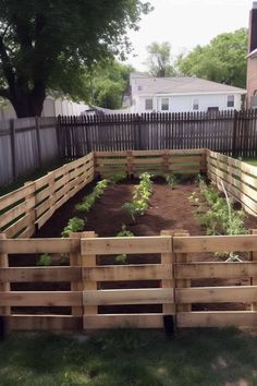 the garden is ready to be planted and put into the fenced in area for people to see