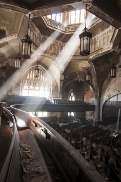 sunlight shining through the windows in an old building with lots of light coming from it