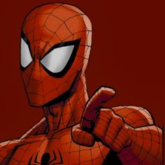 spider - man pointing at the camera with his hand in front of him and wearing an orange suit