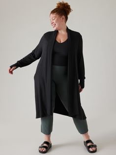 FOR: Layering up to and from your workout FEEL: Nirvana is our softest fabric FAVE: Side pockets stash your essentials Thumbholes hold sleeves in place and keep warmth in Improved fit for a modern look Oversized fit Tunic Body length in size medium: Regular: Front 36" Back 40" Petite: Front 34" Back 38" Tall: Front 38" Back 42" Body length in size Plus/2X: Regular: Front 37.5" Back 41.5". Long Sleeve Workout Top, Fitted Tunic, Long Sleeve Workout, Bra Dress, High Neck Tank Top, Yoga Tank Tops, Yoga Activewear, Pranayama, Black Trim