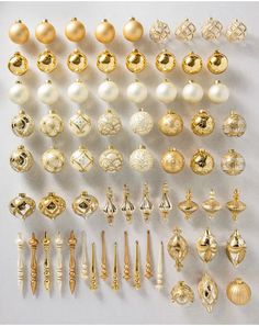 an assortment of gold and white earrings