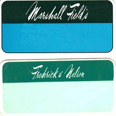 three different colored labels with the names of two men and one is blue, green, white