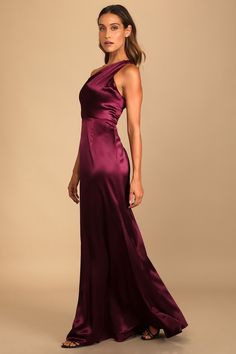 Lulus Exclusive! Feel like a VIP when you show up in the Lulus On the Guest List Burgundy Satin One-Shoulder Maxi Dress! Sleek stretch-woven satin shapes this glam dress that has a wide strap, a one-shoulder neckline, and a lightly pleated bodice. A high waist tops a full maxi skirt for a regal finish. The open back is accented with two wide straps. Hidden back zipper/clasp. Fit: This garment fits true to size. Length: Floor length. Size small measures 61" from shoulder to hem. Bust: Great for a Black Red Floral Dress, Blush Pink Maxi Dress, Blue Lace Maxi Dress, Teal Floral Dress, Asymmetrical Maxi Dress, The Guest List, Burgundy Maxi Dress, Beautiful Red Dresses, Full Maxi Skirt