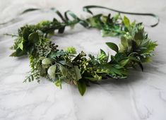 Our signature handmade Misty crown is the perfect accessory to wear to a barn wedding or forest themed wedding. This design is one of our best sellers and can really create a statement headpiece. The mix of intertwined artificial leaves, ferns and twigs gives a relaxed earthy feel that will create the wow factor. Why buy from Innocent Chaos? At Innocent Chaos we carefully select each of our flowers by hand to make sure that your delicate designs carry the highest level of quality. Each of our cr Flower Crown Green, Green Flower Crown, Larp Accessories, Woodland Crown, Gold Bridal Crowns, Roses Photography, Green Crown, Flower Wreath Hair, Daydream Believer