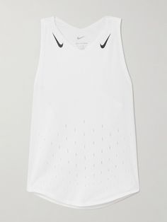 a white tank top with black nike logo