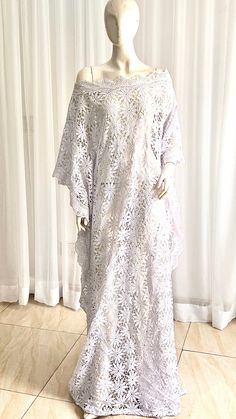 This Silk Kaftan maxi dress is made with Polysilk and Lace Front. It can be styled in different ways, you can dress it up with high heels or dress down with flats/sneakers. The Hand can be worn in 2 ways. one way shows off the arm, the 2nd way has the arm covered for modesty. Notice the slits.Other prints are also available, kindly start a conversation to ask for more information and pics.Contact us for custom looks and more style options. Sizing 🌺 Your height or desired kaftan length is needed Lace Kaftan, The Slits, Kaftan Maxi Dress, Silk Kaftan, Maxi Gown Dress, Casual Jumpsuit, Kaftan Dress, Casual Sets, All White