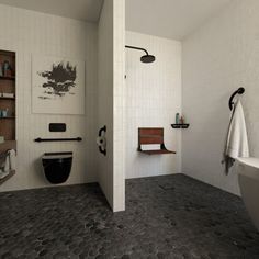 a bathroom with white walls and black flooring