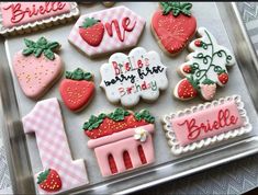 some decorated cookies are on a tray