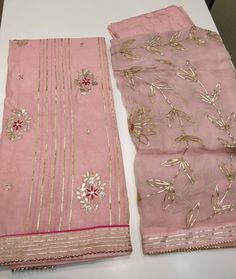 Item Overview ATHARVA Hand Embroidered Salwar Kameez w/Beautiful Embroidered Gota Patti Work in Peach Chanderi Slk w/ Exclusive Gota Patti Work Dupatta/ CH Dno. CH Fabric: * Shirt Chanderi Silk 2.5 Mts, in Peach w/Elegant embroidery Gota Patti work * Dupatta: Pure Chiffon Chinnon Dupatta 2.5Mts w/Beautiful Gota Patti jaal work. * Bottom Santoon Silk 2.5 Mts. Peach Excusive Hand Embroidered Party Wear Punjabi Suit. Customization: * Fabrics: Designs Can be made in different Fabrics. * Stitching Av Jaal Design, Gota Patti Work, Embroidery Suits Punjabi, Indian Salwar, Brooch Diy, Pure Chiffon, Elegant Embroidery, Handbag Outfit, Hand Work Embroidery