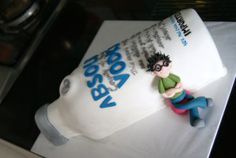 a birthday cake with a person on it