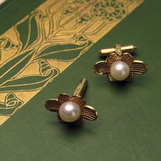 A T T R I B U T E S Vintage | Gender-free Jewelry | One of a Kind | Alternative Bridal Jewelry | Wedding Accessories  D E T A I L S ~ Vintage Floral Cufflinks ~ Saltwater Pearls* ~ 14K Gold  ~ Hallmarked  ~ Gold Stamped *Did you know?: Saltwater pearls are rarer than freshwater pearls. This is because the saltwater oyster typically only produces one pearl at a time. Freshwater mussels can produce up to 30 pearls at a time. S P E C S  ~ Total Weight: 9.2g ~ Length of flower: approx. 1" ~ Width of Freshwater Mussels, Wedding Cuff Links, Wedding Cuff, Gender Free, Pearl Vintage, Alternative Bridal, Saltwater Pearls, Cufflinks Wedding, Gold Flower