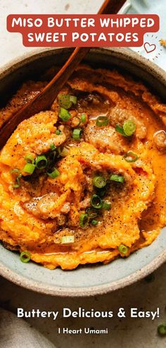 a bowl filled with buttered sweet potatoes and topped with green onions, parsley