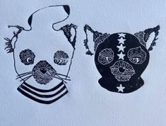 two black and white drawings of cats on paper