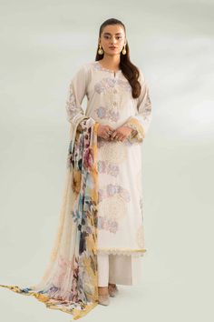 Brand: NishatProduct Code: 42401439Collection: Nishat Unstitched Spring Summer Eid EditionFabric: Cambric DESCRIPTION: Become the ultimate trendsetter with this embroidered three-piece from the latest unstitched summer collection. SHIRT Dyed Cambric Shirt: 3 Meter Embroidered Front + Motifs + Border Fabric: Cambric Color: Ivory DUPATTA Digital Printed Pure Chiffon Dupatta: 2.5 Meter Fabric: Chiffon Color: Multi TROUSERS Dyed Cambric Trousers: 2.5 Meter Fabric: Cambric Color: Ivory DISCLAIMER:* Lining, Laces, and Tassels are not included in unstitched variants.* Embellishment items in stitched outfits are subject to market availability.* The actual colors of the outfit may vary from the colors being displayed on your device. CARE INSTRUCTIONS: Extra Fabric Has Been Used For Shoot Original C Printed Organza, Lace Dress Design, Pure Chiffon, Silk Trousers, Organza Dupatta, Suit Fabric, Printed Canvas, Pakistani Outfits, Fabric Stores Online