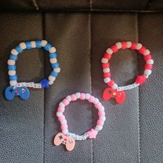 for siblings, friends, couples, polycules, and anyone else who wants to match! each single features a cute video game controller charm :) Trio Kandi Bracelets, Emo Matching Bracelets, Lil Peep Matching Bracelets, Matching Character Bracelets, Kuromi Matching Bracelets, Player 1, Video Game Controller, Game Controller, Cute Gif