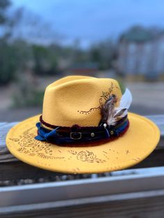 Boutique Hand made and burned Felt Hats by Nona. These brim felt hats are adjustable to fit any head and are custom to your liking.  This Listing is of a Yellow Rose of Texas with details. I am happy to add that special color or item to your hat. Feel free to message me. Handmade Felt Hat For Winter Rodeo, Adjustable Felt Cap, Handmade Adjustable Felt Cap, Custom Flat Brim Felt Hat For Festivals, Adjustable Felt Hat Band For Fedora, Adjustable Felt Fedora Hat Bands, Handmade Flat Brim Felt Hat For Fall, Handmade Brimmed Felt Hat For Fall, Adjustable Felt Hat With Short Brim