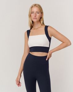 MARTA TOP NAVY & CREAM COMBO | NYLORA Fitted Athleisure Crop Top With Removable Bra Pads, Fitted Versatile Crop Top With Removable Bra Pads, Versatile Fitted Crop Top With Removable Bra Pads, White Bra Friendly Elastane Top, White Bra-friendly Tops In Elastane, Fitted White Sports Bra In Elastane, Fitted Tops With Removable Bra Pads, Fitted White Elastane Sports Bra, White Fitted Elastane Sports Bra