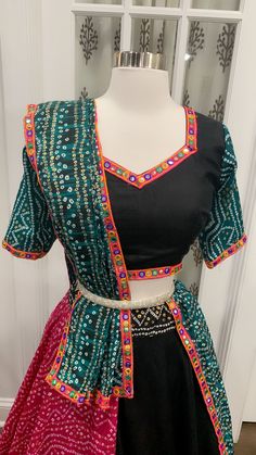 Bandhini Designer big flair 8mts Chaniya Choli for Navratri Season in elegant Black , green and rani pink combo size 38 plus margin. Beautiful Chaniya choli with 8 meter flair. Fits size 38 plus margin Pink Chaniya Choli Navratri, Anarkali Multicolor Choli For Navratri, Navratri Multicolor Anarkali Choli, Navratri Multicolor Chandbali Salwar Kameez, Multicolor Anarkali Salwar Kameez With Unstitched Blouse, Traditional Drape Multicolor Anarkali Set For Navratri, Multicolor Traditional Anarkali Set For Navratri, Multicolor Chandbali Lehenga For Festivals, Green Cutdana Choli For Navratri