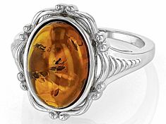 14x10mm Oval Amber Rhodium Over Sterling Silver Ring. Measures Approximately 0.81"L x 0.74"W. Not Sizeable. Sterling Silver Ring, Silver Ring, Sterling Silver Rings, Amber, Silver Rings, Sterling Silver, Ring, Silver